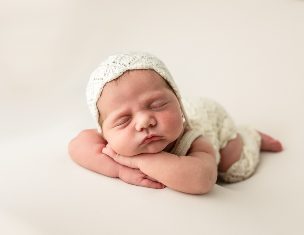 Rekart Photography offers several newborn outfits.